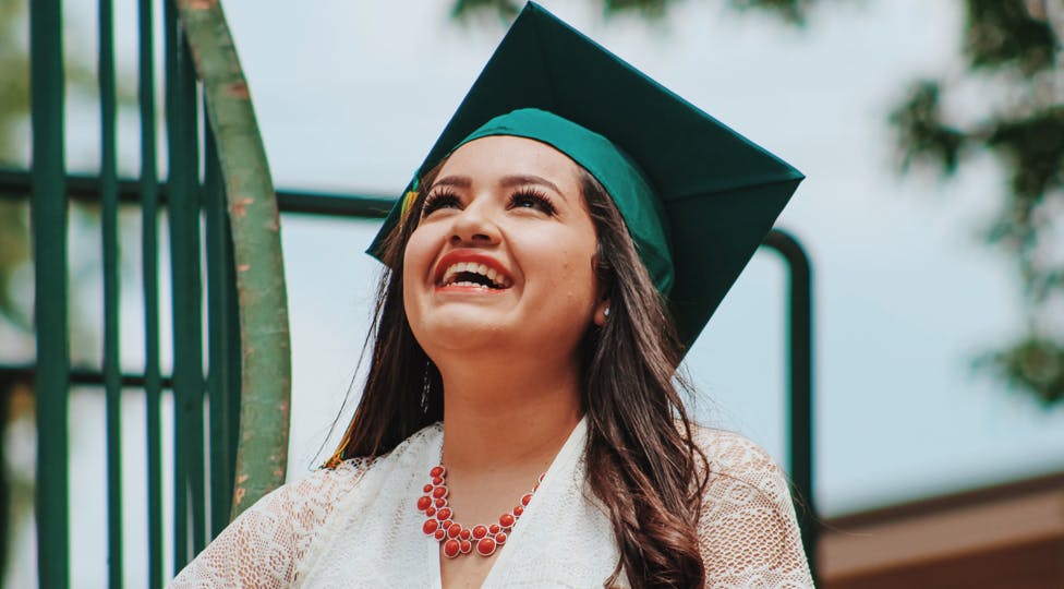 Graduate smiling.jpg?ixlib=rails 2.1